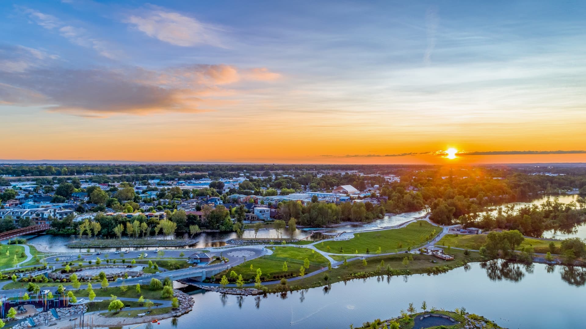 Aerial view of Garden City, Idaho at sunset along the Boise River