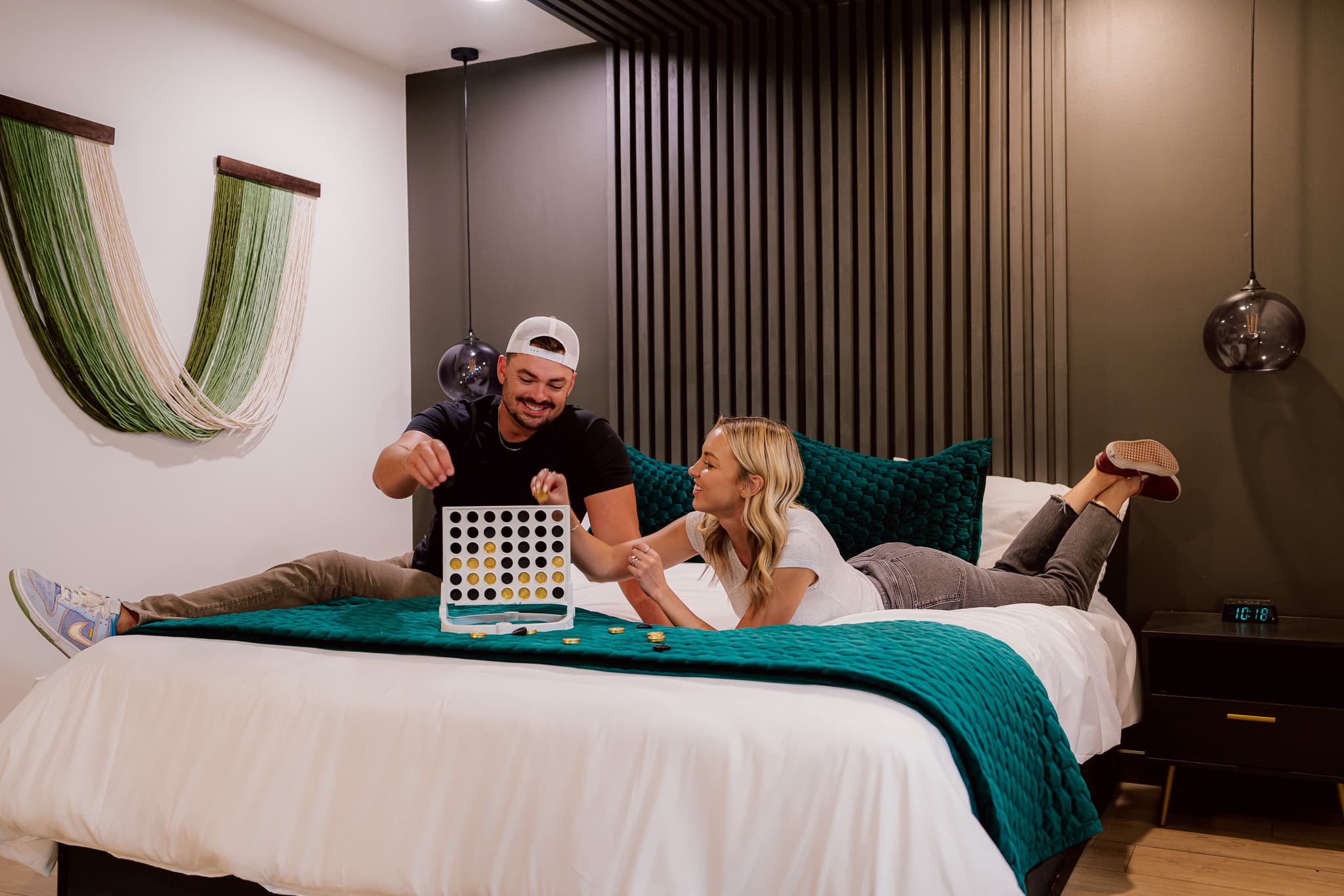 Couple playing connect for in an Arcadia Hotel Room